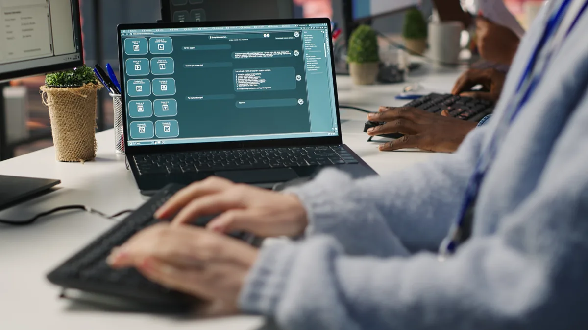 An account manager using an AI chatbot to help respond to customers