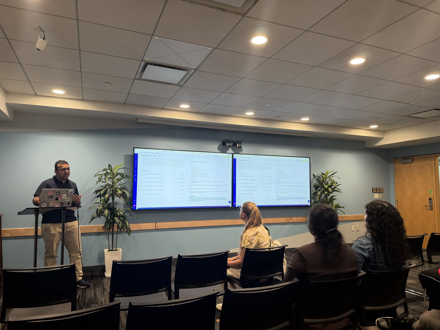 Speaker presenting ContextQA AI insight test case at The Agentic Quality Tour Boston